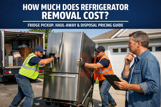 junk removal workers hauling away a heavy stainless steel refrigerator while a homeowner reviews the removal cost estimate in a suburban driveway